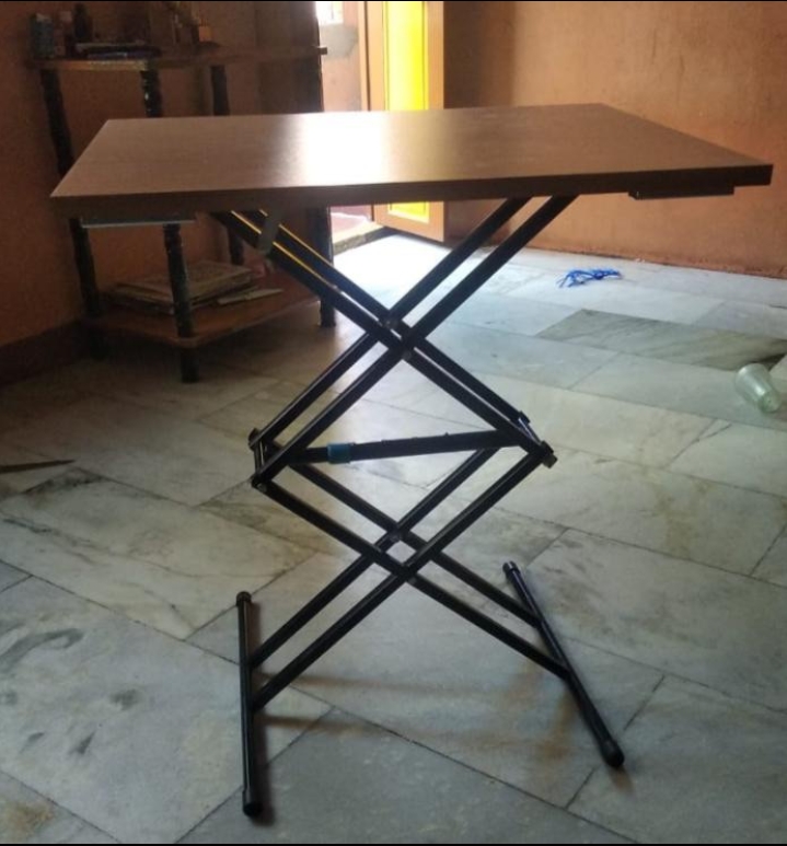 Wooden adjustable table