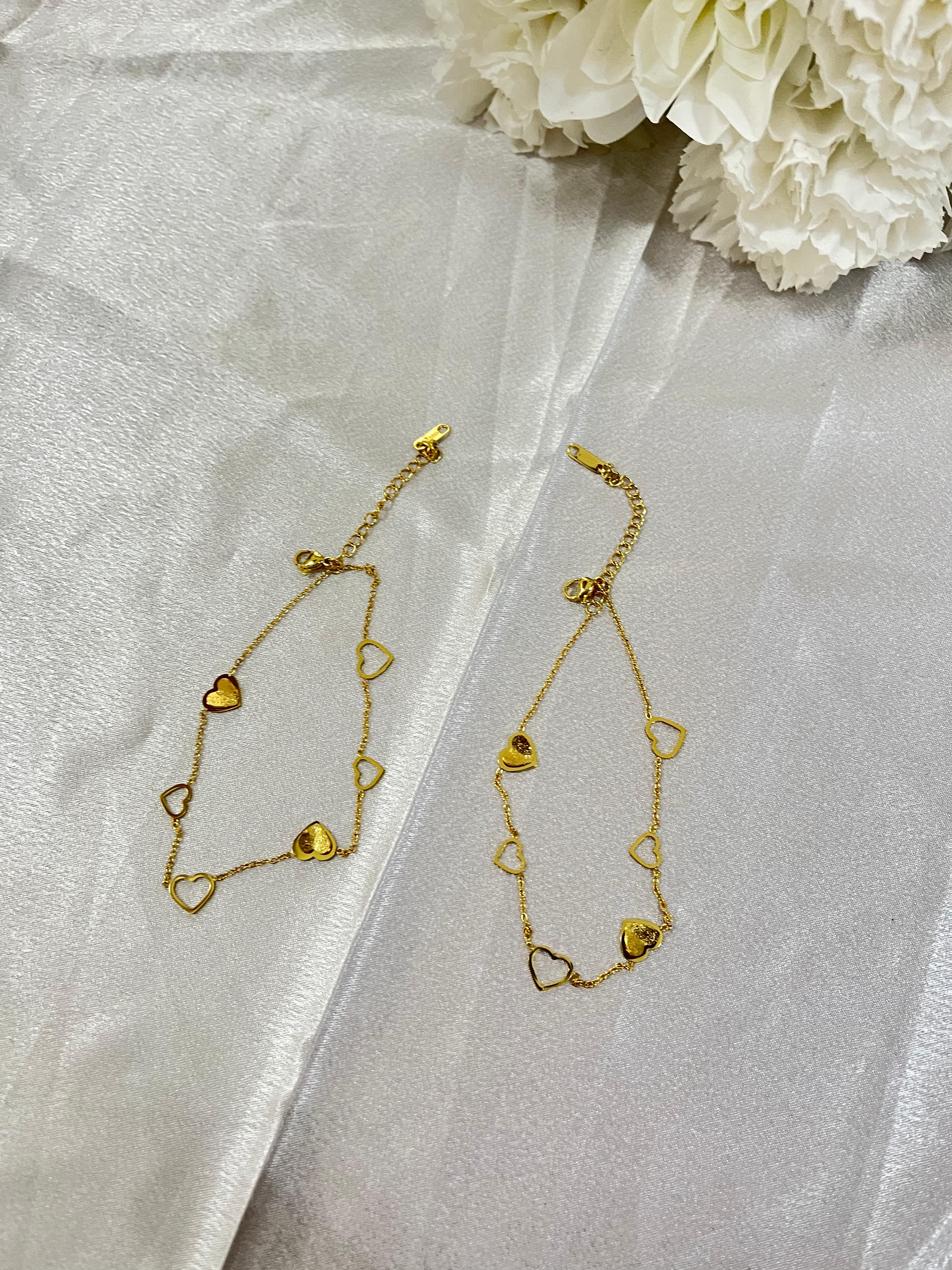 heart-charm anklets.